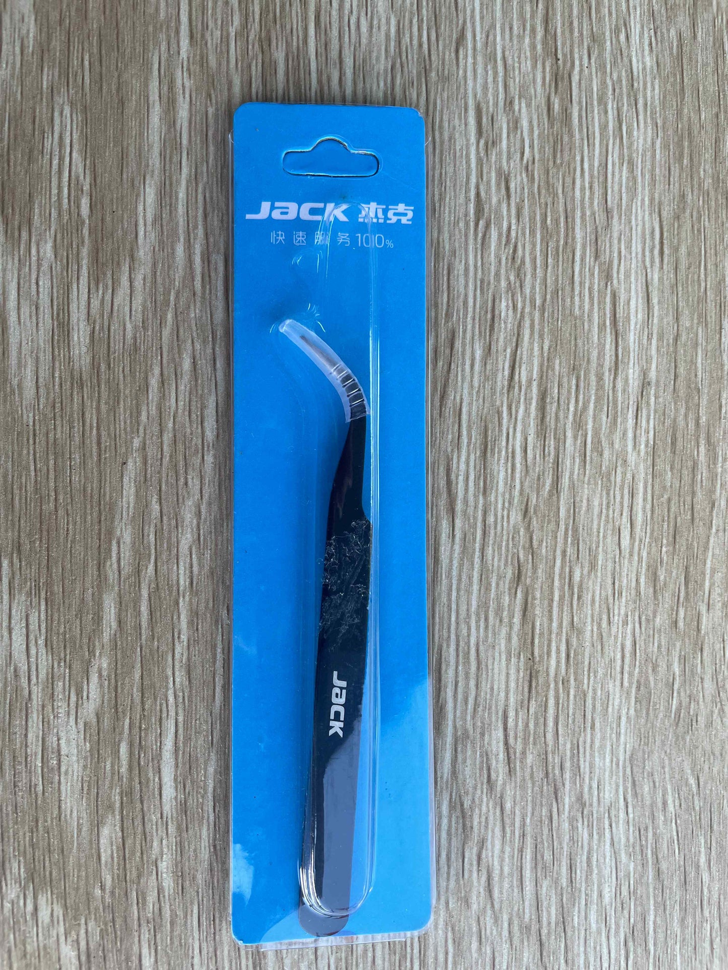 Jack brand short tweezers in a packet