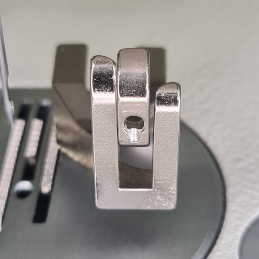 Under view of smooth bottom presser foot set for walking foot machine